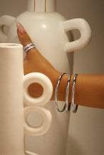 Load image into Gallery viewer, Silver bangle set on model

