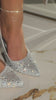 Video of silver embellished pumps