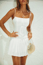 Load image into Gallery viewer, Model Wearing White Dress Styled with Gold Shell Bag
